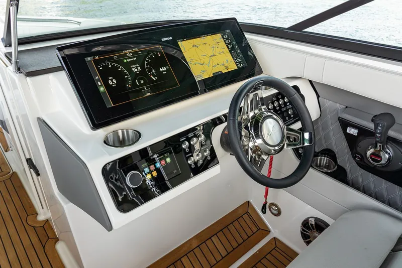 Slide: The Image of Manufacturer Provided Image: 2023 Sea Ray SLX 280 helm with advanced navigation and control systems. - 26