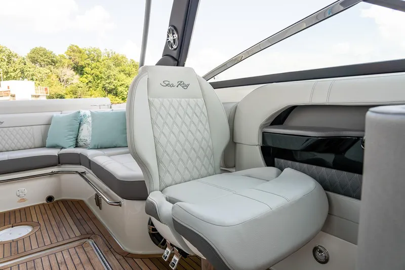 Slide: The Image of Manufacturer Provided Image: 2023 Sea Ray SLX 280 boat interior with luxurious seating and teak flooring. - 27