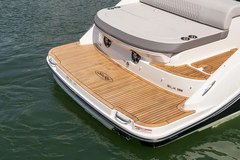 Slide: The Image of Manufacturer Provided Image: 2023 Sea Ray SLX 280 boat stern with teak swim platform. - 28