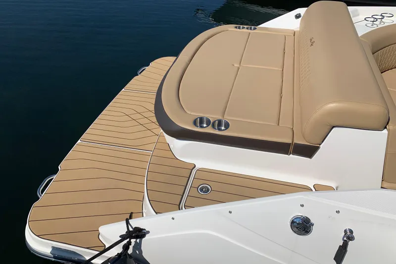 Slide: The Image of 2023 Sea Ray SLX 280 boat with tan seating and swim platform. - 4