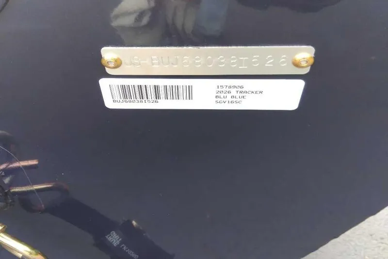Slide: The Image of 2026 Tracker Super Guide V-16 SC boat identification plate with barcode. - 51