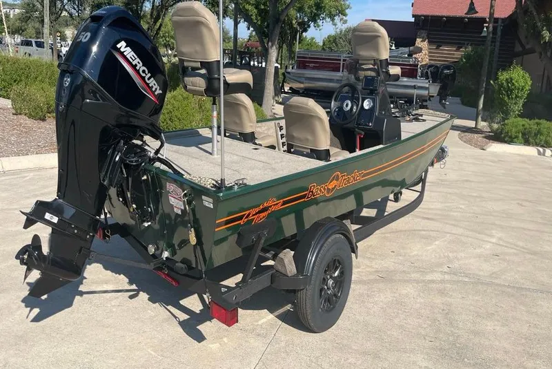 Slide: The Image of 2026 Tracker Bass Tracker Classic Limited boat with Mercury engine on trailer. - 43
