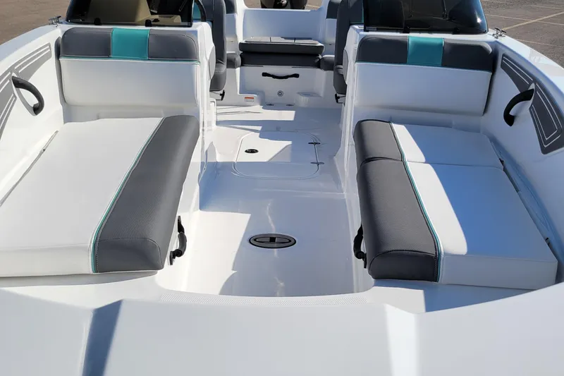 Slide: The Image of 2026 Tahoe T21 boat interior with white and gray seating, modern design. - 3