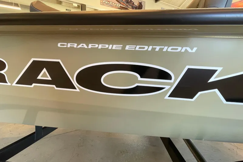 Slide: The Image of 2026 Tracker Pro Team 175 Crappie Edition boat, close-up of logo and branding. - 12