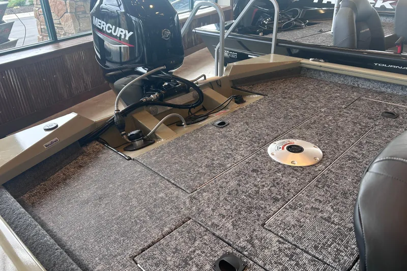 Slide: The Image of 2026 Tracker Pro Team 175 Crappie Edition boat interior with Mercury engine. - 7