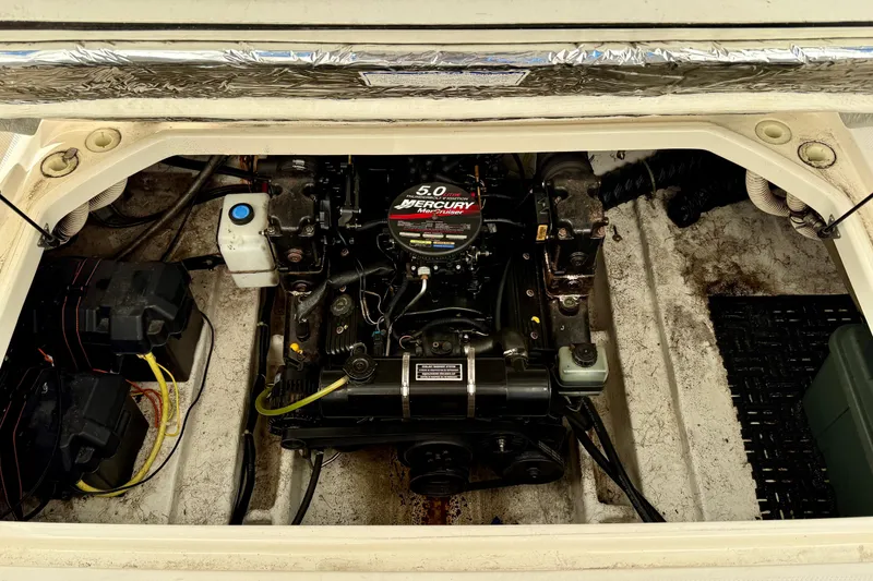 Slide: The Image of Engine compartment of a 2002 Bayliner 2452 Ciera Classic with Mercury motor. - 15