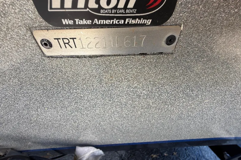 Slide: The Image of 2017 Triton 18 TrX boat identification plate with serial number TRT12211L617. - 22