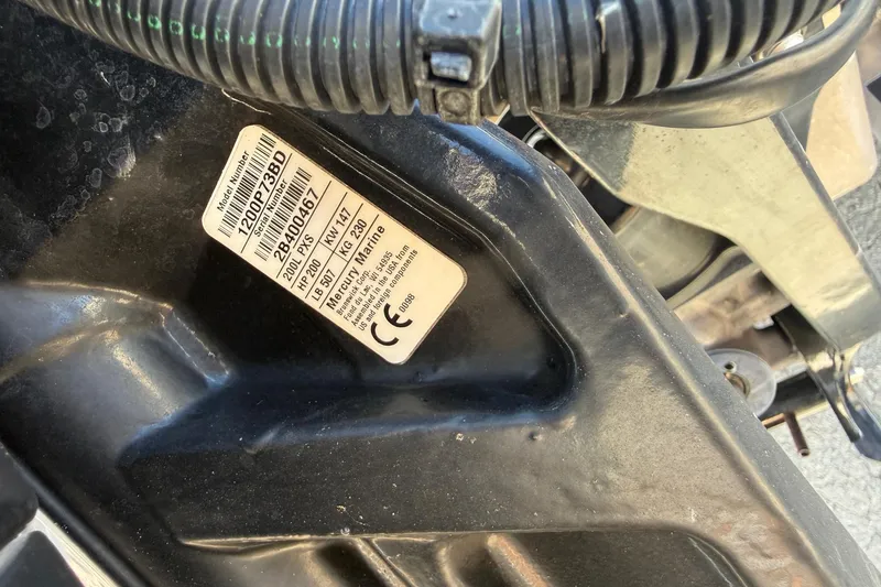 Slide: The Image of Label on 2017 Triton 18 TrX boat engine, showing model and serial numbers. - 23