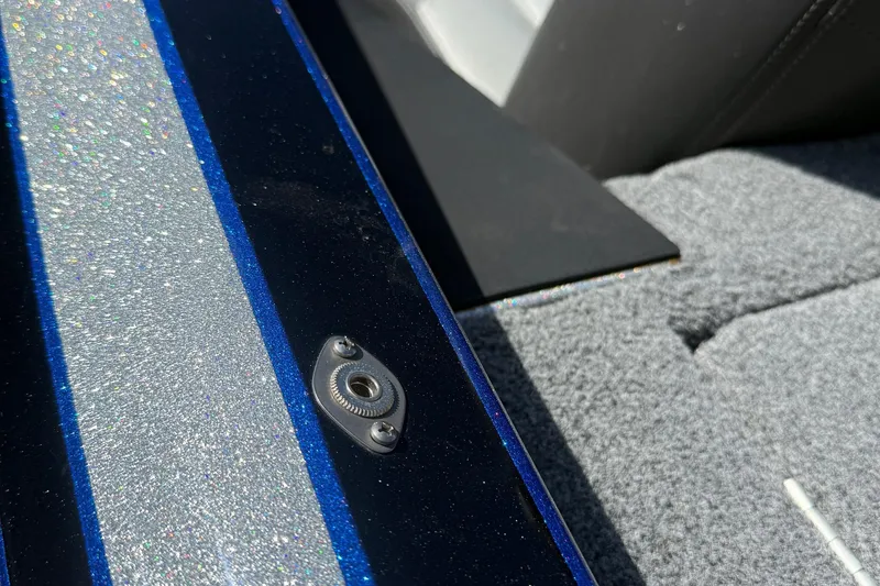 Slide: The Image of 2017 Triton 18 TrX boat interior with glittery blue and silver detailing. - 29