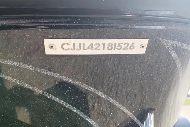 Slide: The Image of 2026 Phoenix 721 ZXL boat hull identification number plate. - 12