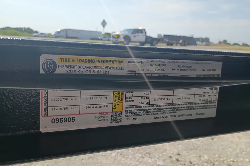 Slide: The Image of Tire and loading information label on a 2026 Phoenix 721 ZXL trailer. - 13