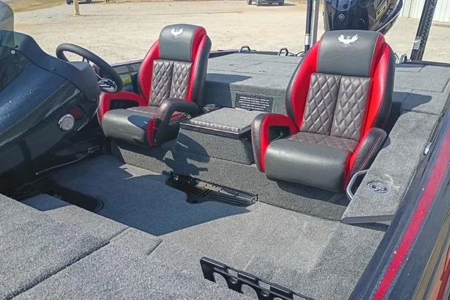Slide: The Image of Interior of 2026 Phoenix 721 ZXL boat with red and black seats. - 6