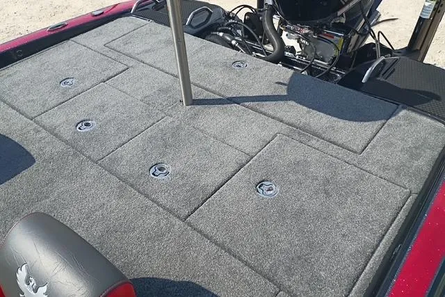 Slide: The Image of 2026 Phoenix 721 ZXL boat deck with storage compartments and motor. - 8