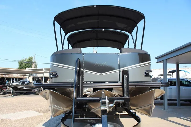 Slide: The Image of 2026 Avalon LSZ Versatile Rear Bench Windshield 27 FT pontoon boat on trailer. - 11