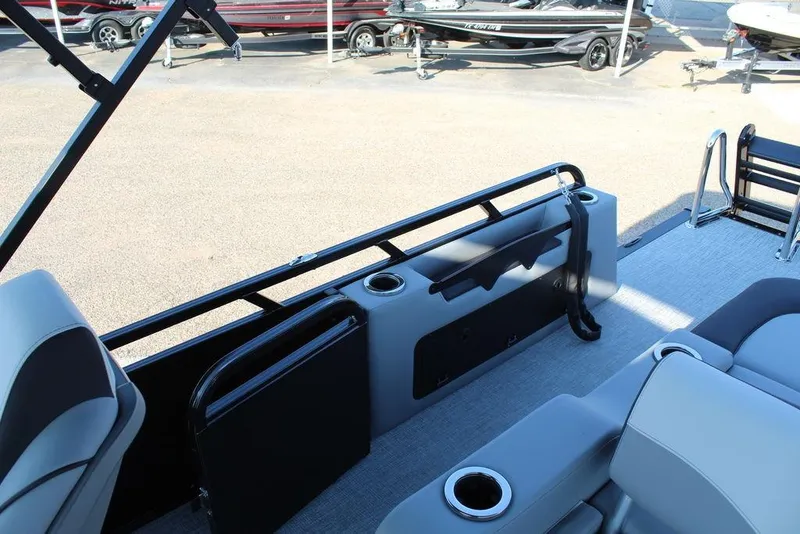 Slide: The Image of 2026 Avalon LSZ Versatile Rear Bench Windshield boat interior with seating and cup holders. - 15