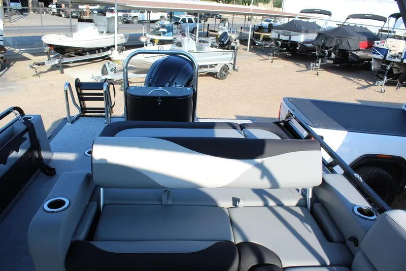 Slide: The Image of 2026 Avalon LSZ Versatile Rear Bench Windshield boat, featuring sleek seating and modern design. - 16