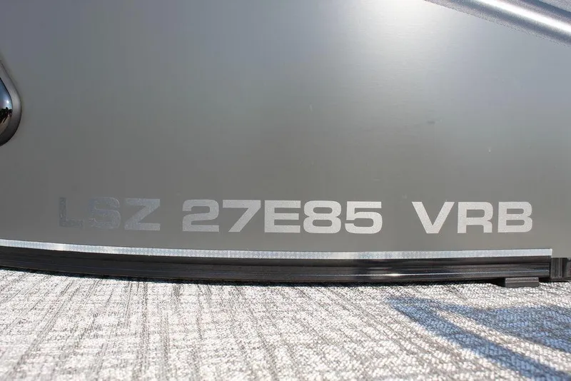 Slide: The Image of 2026 Avalon LSZ Versatile Rear Bench Windshield 27 FT boat model detail. - 19