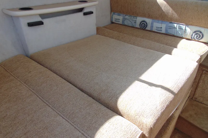 Slide: The Image of Interior cabin of 2002 Bayliner 2452 Ciera Classic with beige upholstery. - 17