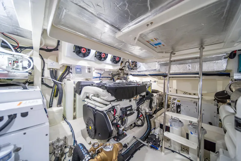 Slide: The Image of Engine room of 2024 Riviera 505 SUV, showcasing advanced marine technology and equipment. - 29