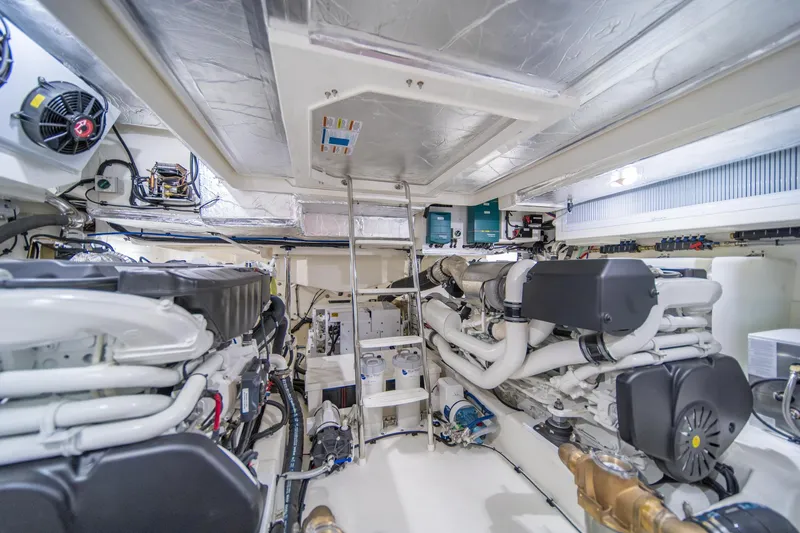 Slide: The Image of Engine room of 2024 Riviera 505 SUV, showcasing advanced marine engineering and equipment. - 33