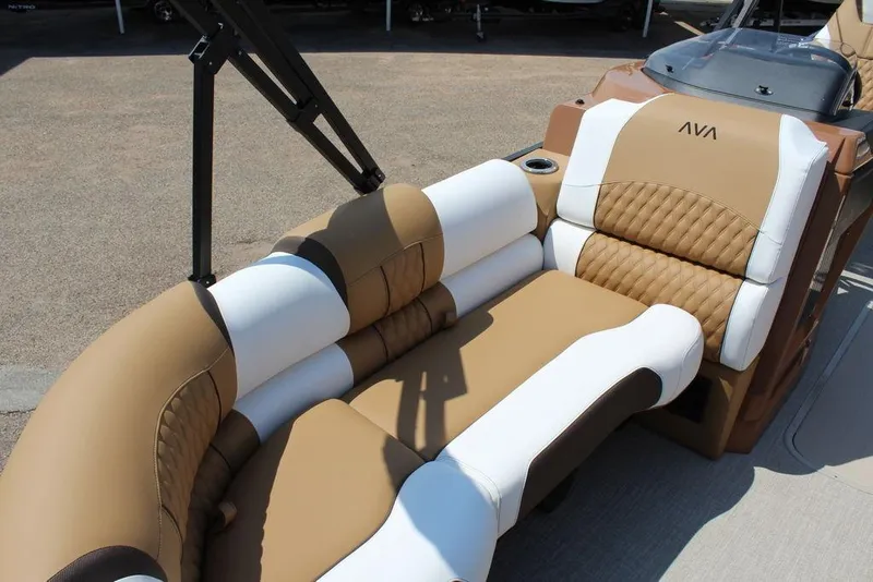 Slide: The Image of 2026 Avalon Catalina Versatile Rear Bench 25 FT with luxurious tan and white seating. - 11
