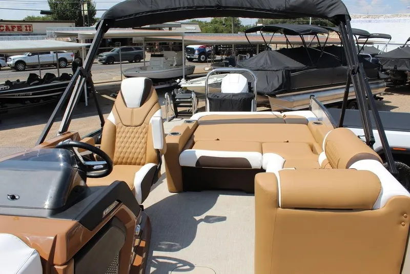 Slide: The Image of 2026 Avalon Catalina Versatile Rear Bench 25 FT boat with luxurious seating and sleek design. - 12