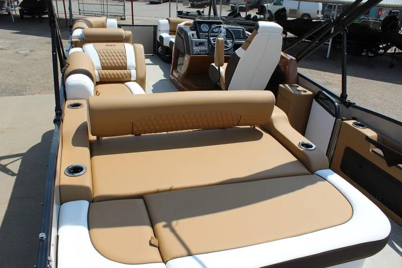 Slide: The Image of 2026 Avalon Catalina Versatile Rear Bench 25 FT with luxurious tan seating and modern dashboard. - 18