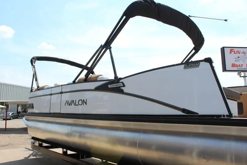 Slide: The Image of 2026 Avalon Catalina Versatile Rear Bench 25 FT pontoon boat, side view. - 3