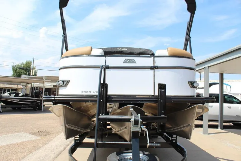 Slide: The Image of 2026 Avalon Catalina Versatile Rear Bench 25 FT pontoon boat on trailer. - 8