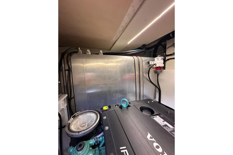 Slide: The Image of Engine room of 2015 Beneteau Swift Trawler 50 with Volvo components. - 101