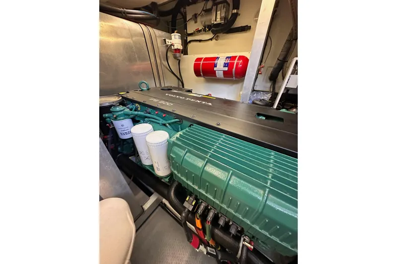 Slide: The Image of Engine room of 2015 Beneteau Swift Trawler 50 with Volvo Penta engine. - 103