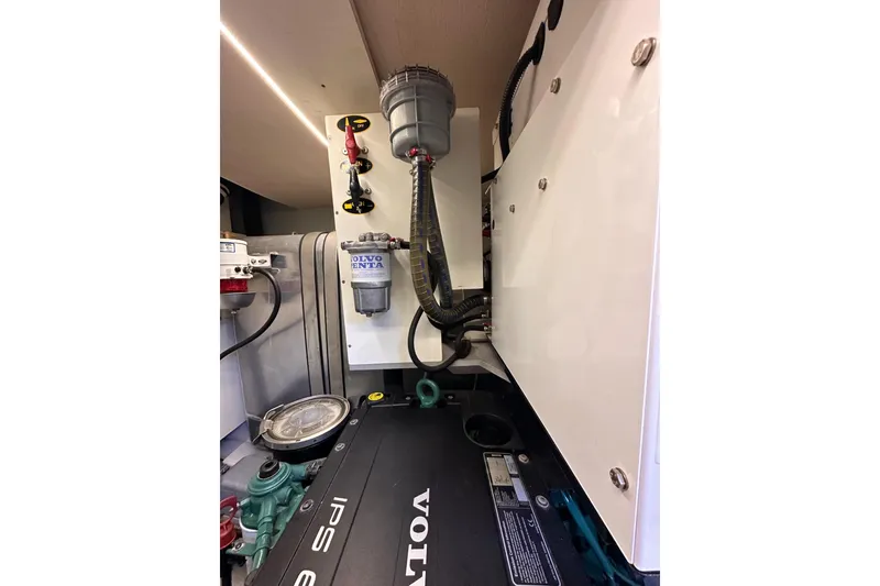 Slide: The Image of Engine room of 2015 Beneteau Swift Trawler 50 with Volvo Penta components. - 106