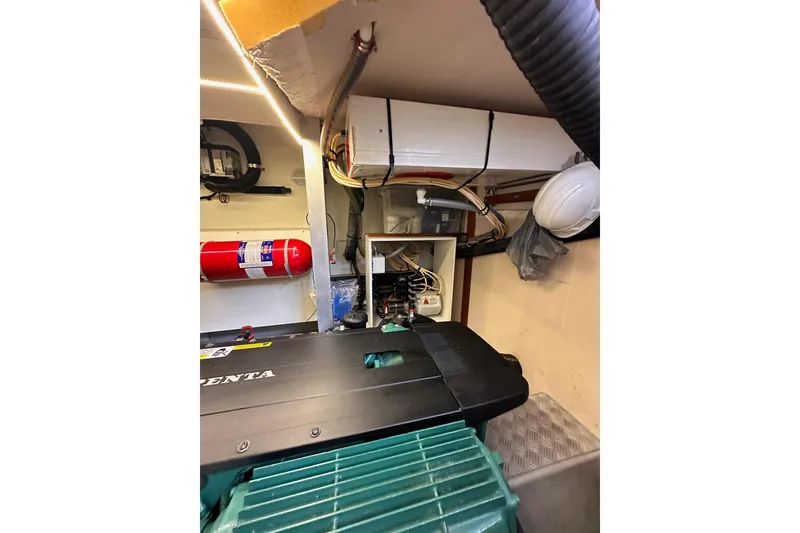 Slide: The Image of Engine room of 2015 Beneteau Swift Trawler 50 with Volvo Penta engine. - 99