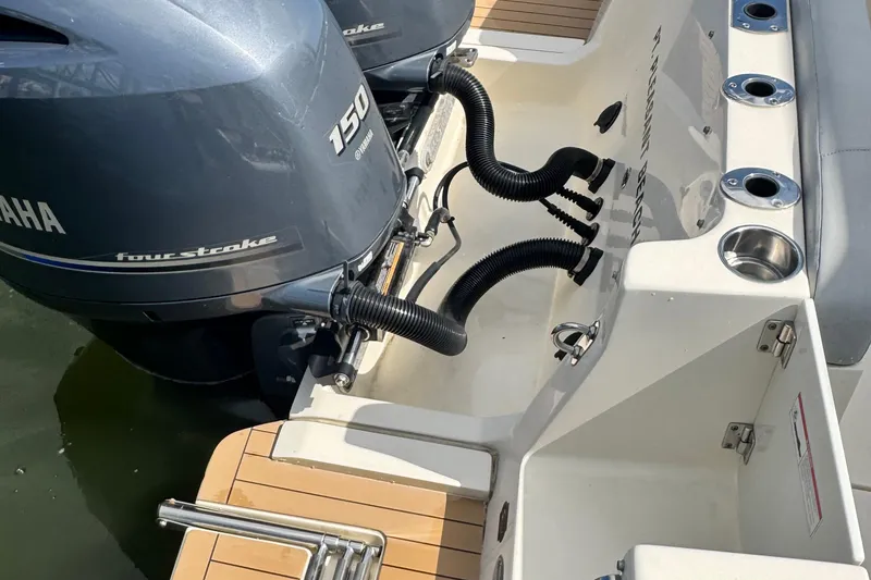 Slide: The Image of 2020 Scout 255 Dorado boat with Yamaha 150 four-stroke engines, rear view. - 15