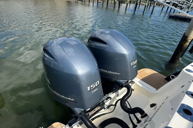 Slide: The Image of Twin Yamaha 150 outboard engines on a 2020 Scout 255 Dorado boat. - 16