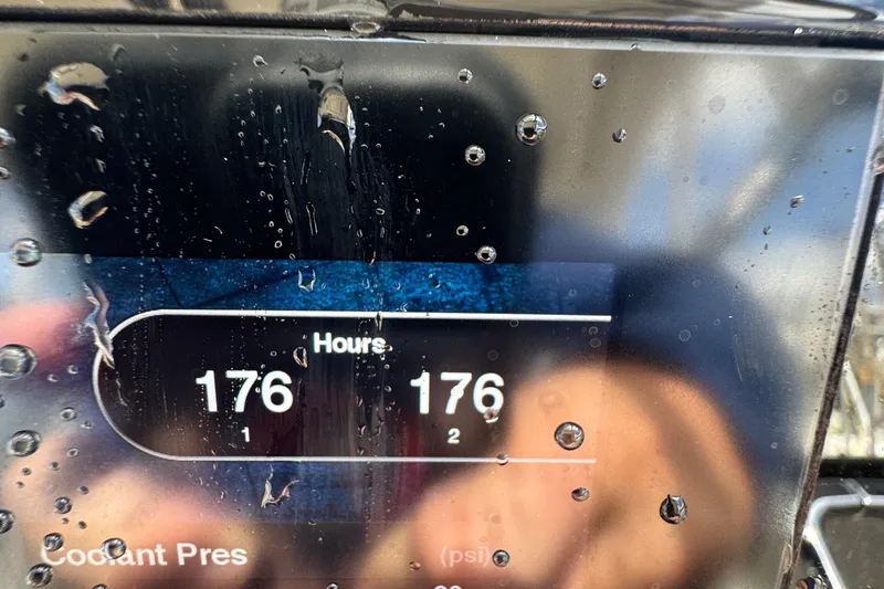 Slide: The Image of Close-up of a 2020 Scout 255 Dorado display showing 176 engine hours. - 18