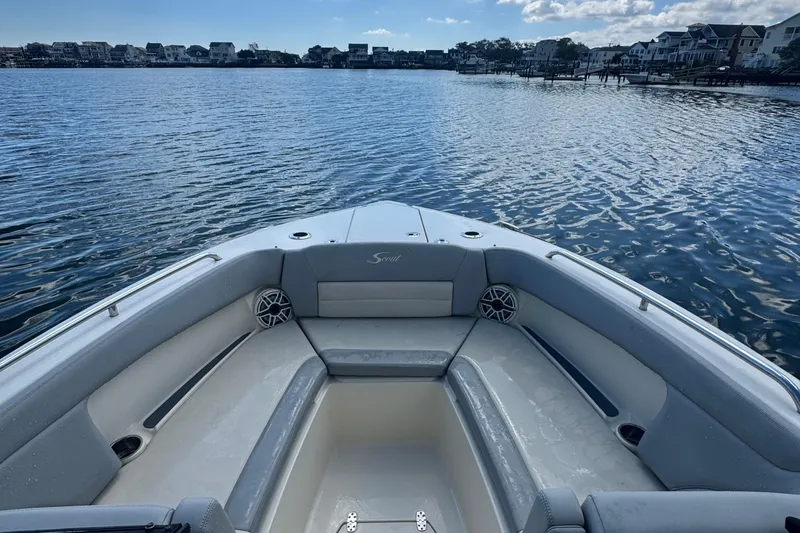 Slide: The Image of 2020 Scout 255 Dorado boat interior with waterfront view, featuring comfortable seating. - 9