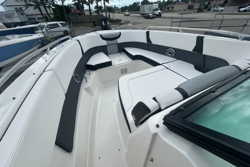 Slide: The Image of 2021 Chaparral 280 OSX boat interior with spacious seating and modern design. - 16
