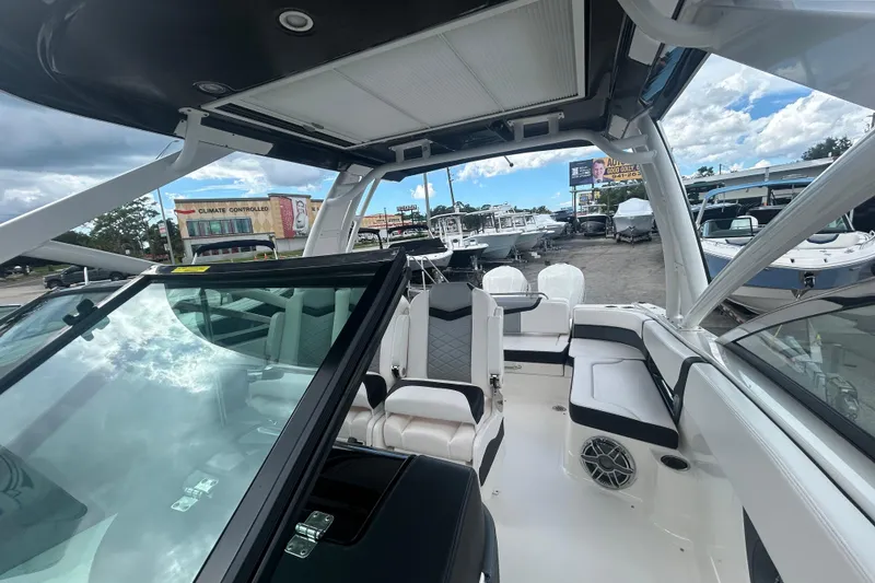 Slide: The Image of 2021 Chaparral 280 OSX boat interior with seating and modern design. - 18