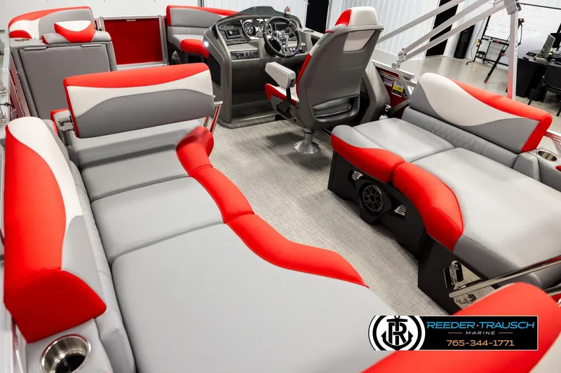 Slide: The Image of Luxurious 2026 Avalon LSZ QLS boat interior with red and gray seating. - 11