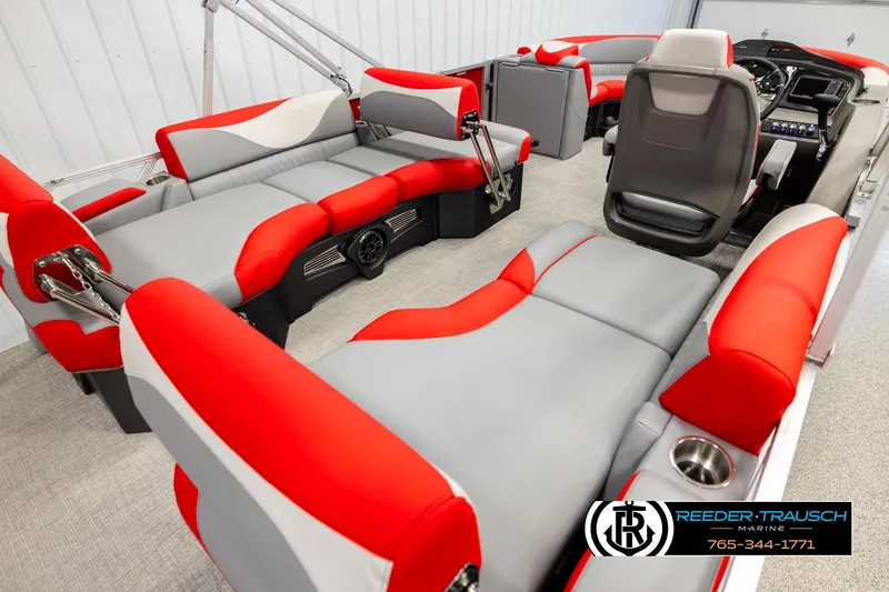 Slide: The Image of 2026 Avalon LSZ QLS pontoon boat interior with red and gray seating, modern design. - 12