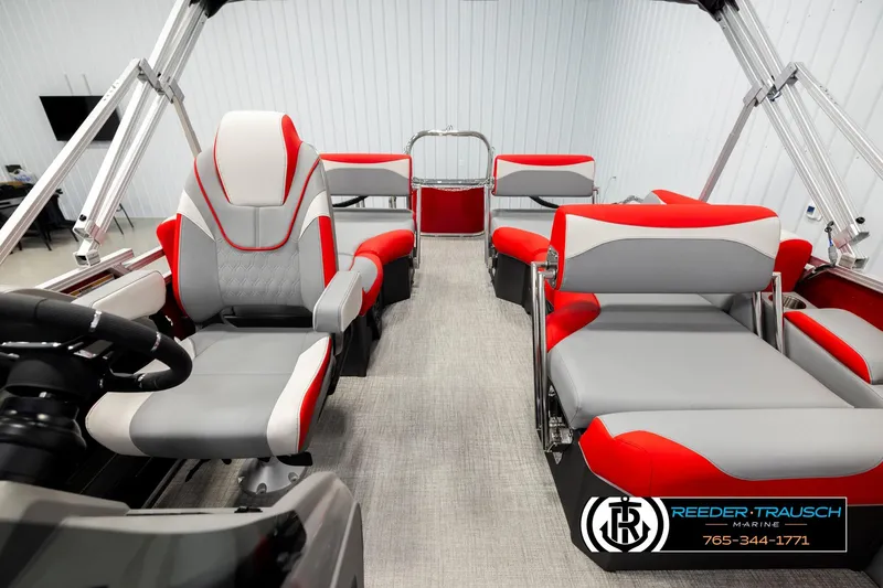 Slide: The Image of 2026 Avalon LSZ QLS boat interior with red and gray seating, steering wheel, and modern design. - 14