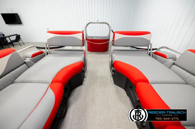 Slide: The Image of Luxurious interior of 2026 Avalon LSZ QLS pontoon boat with red and gray seating. - 15