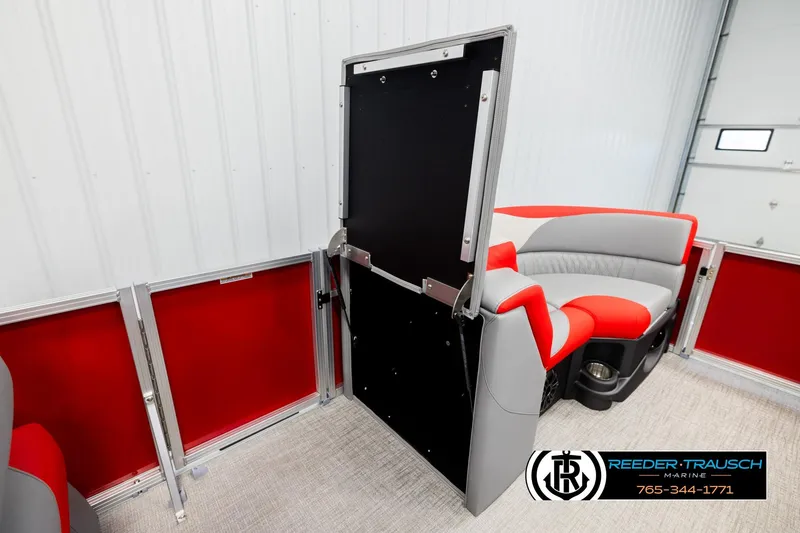 Slide: The Image of 2026 Avalon LSZ QLS boat interior with red and gray seating, open storage compartment. - 29