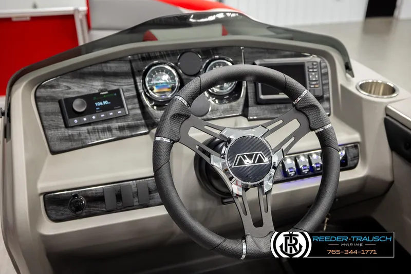Slide: The Image of Steering wheel and dashboard of 2026 Avalon LSZ QLS boat, featuring modern controls and gauges. - 35