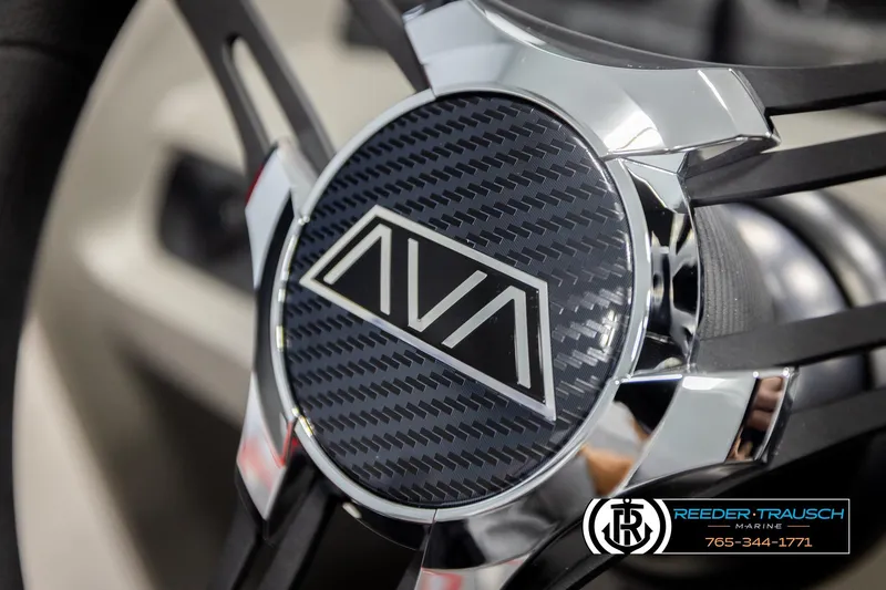 Slide: The Image of Close-up of 2026 Avalon LSZ QLS steering wheel with carbon fiber design. - 36