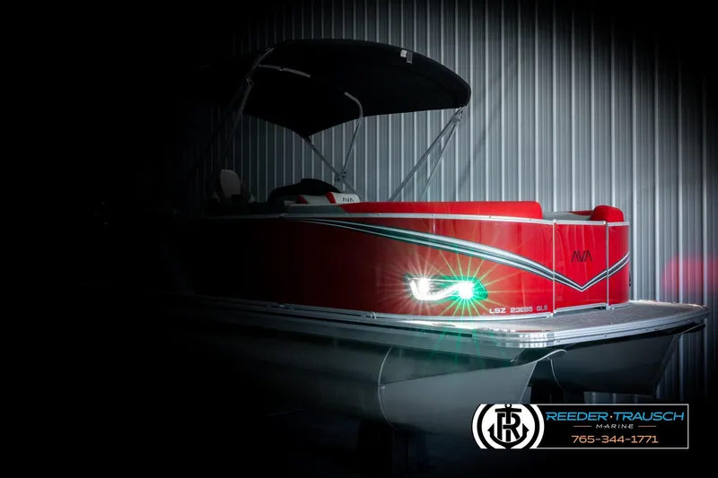 Slide: The Image of 2026 Avalon LSZ QLS pontoon boat with sleek red design and illuminated headlight. - 4