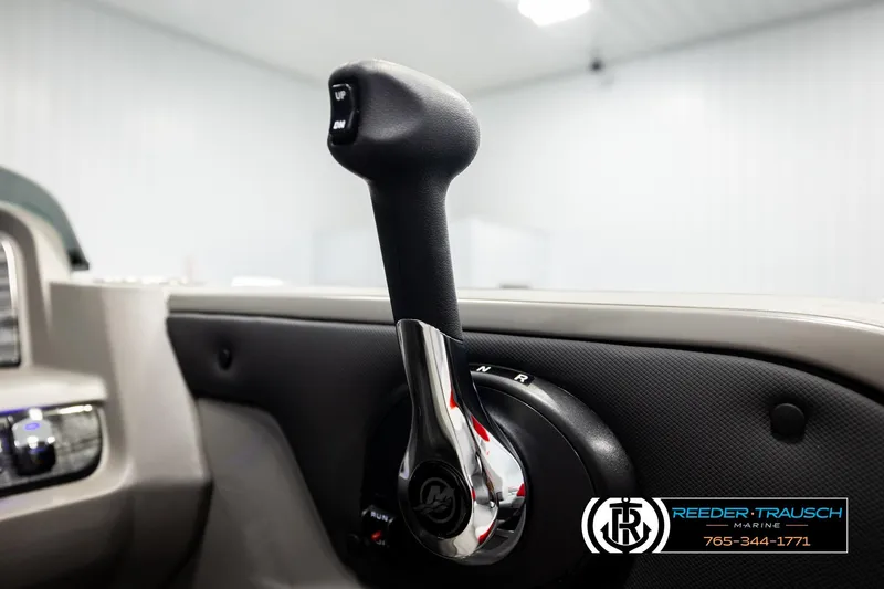 Slide: The Image of 2026 Avalon LSZ QLS boat throttle control in a sleek, modern interior design. - 42