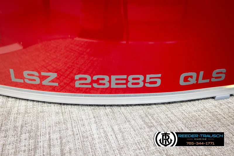 Slide: The Image of Red Avalon LSZ QLS 2026 model with "23E85" marking, Reeder-Trausch Marine logo. - 51