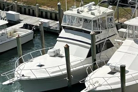Slide: The Image of 1989 Viking 41 Convertible yacht docked at marina, aerial view. - 1